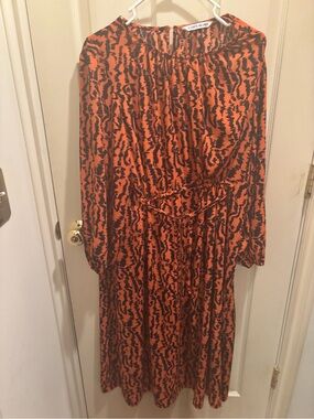 Orange and Black Printed Long Sleeve Midi Dress. Size large